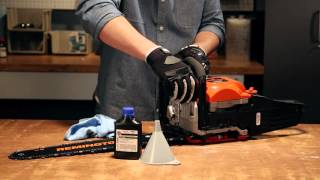 How to Add Bar and Chain Oil to Your Gas Chainsaw [upl. by Eirual91]