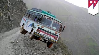 Nepal bus crash Overcrowded bus plunges hundreds of feet down steep hill killing 30  TomoNews [upl. by Dorina787]